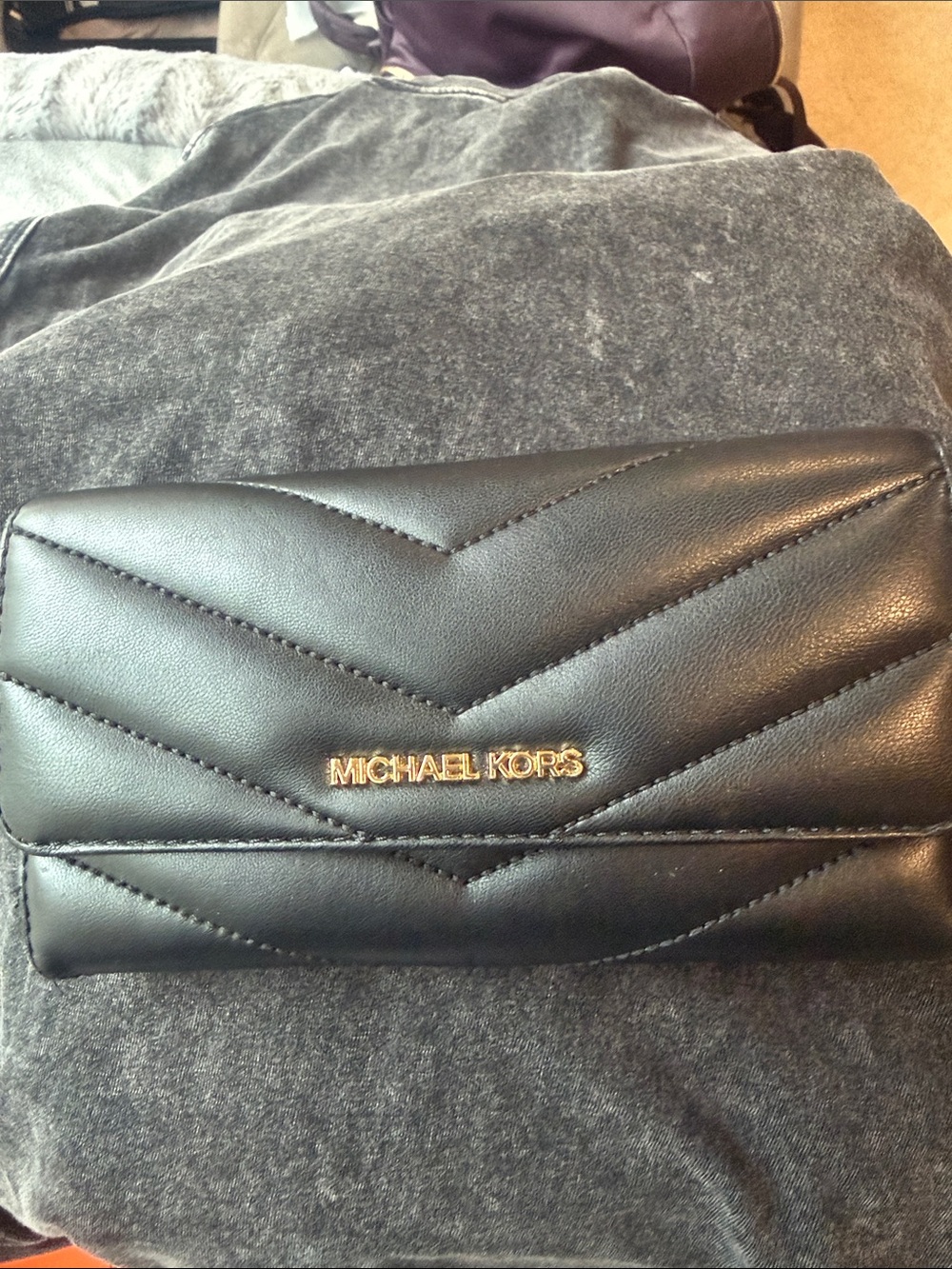 Michael Kors Black Quilted Chevron Leather Wallet with Gold Logo